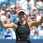 Muguruza wallops Halep to win Cincy